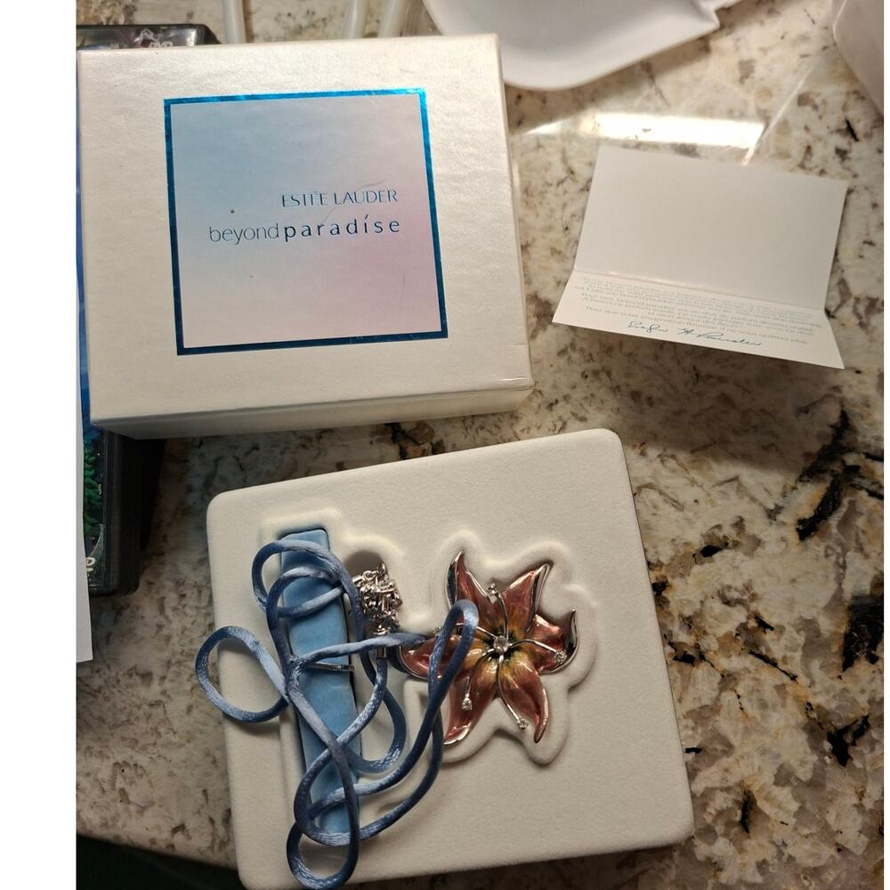 Estée Lauder Beyond Paradise Pendant Necklace.